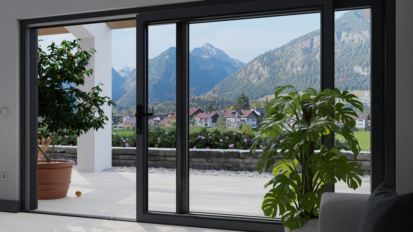 Große Hebe-Schiebe-Tür aus GEALAN S 9000 mit Blick auf Berge und Terrasse